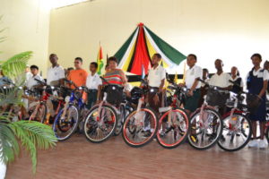 Mahaica recipients of bicycles and backpacks