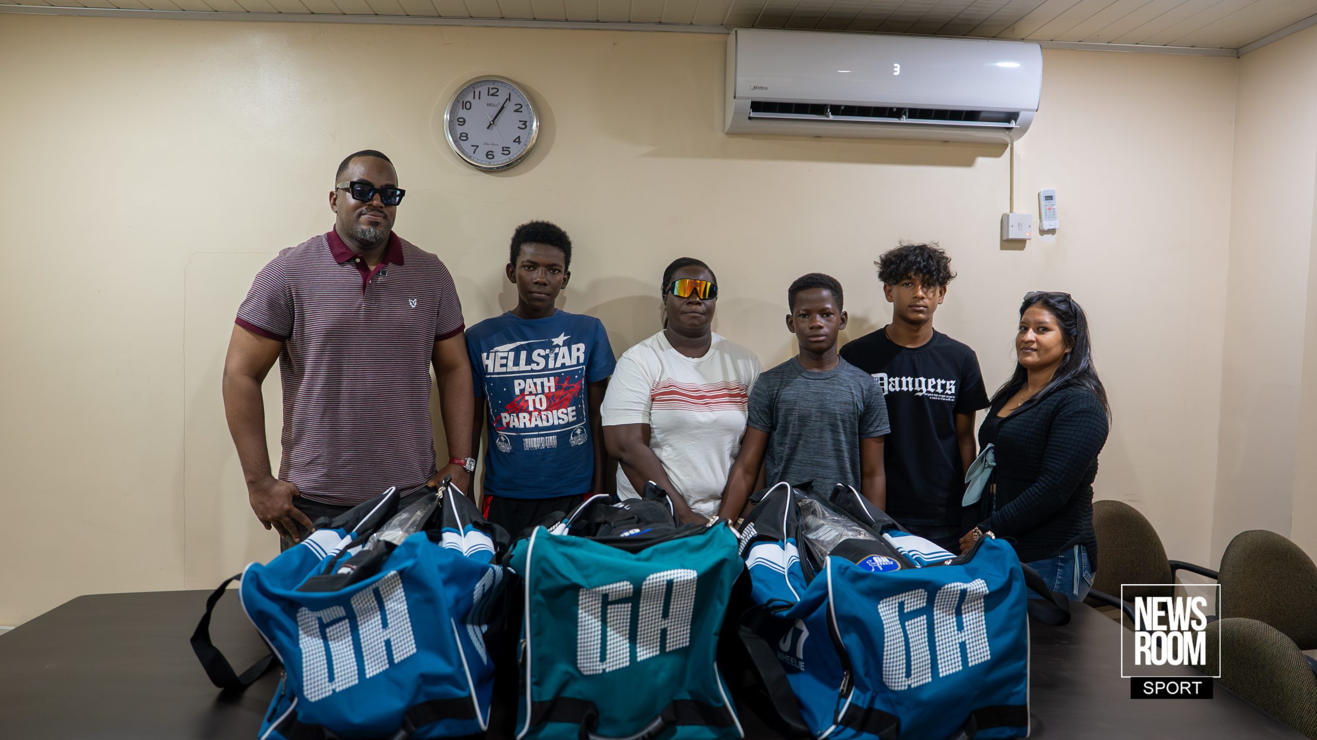 U-13 trio receives cricket gear from agent Colin Bynoe Jr.